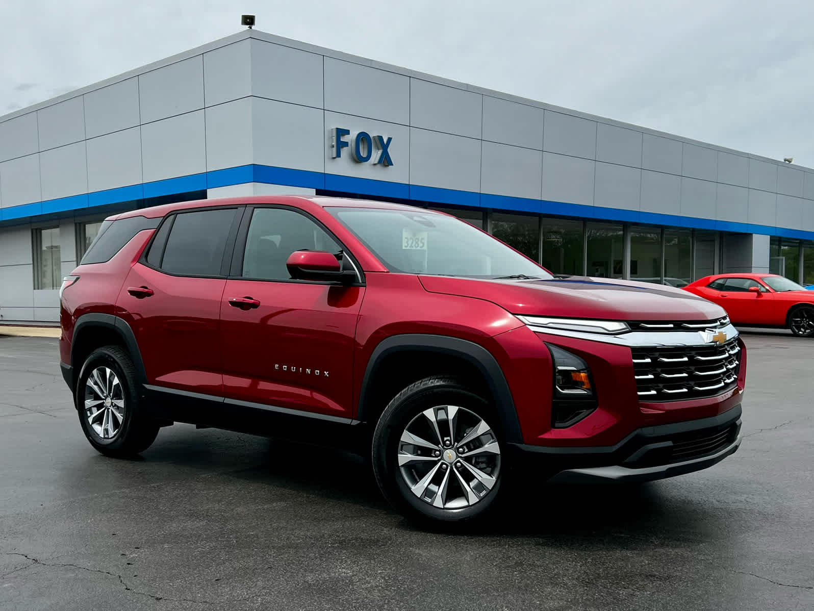 2026 Chevrolet Equinox LT in Radiant Red Tintcoat — front three-quarter view